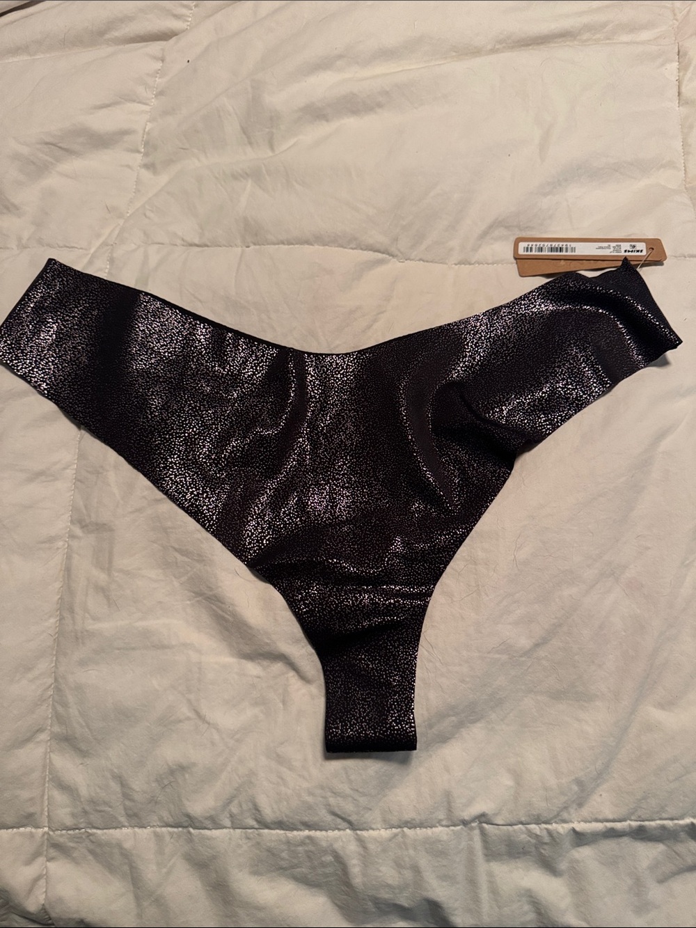 SKIMS Metallic Speckled Thong Panty in Charcoal